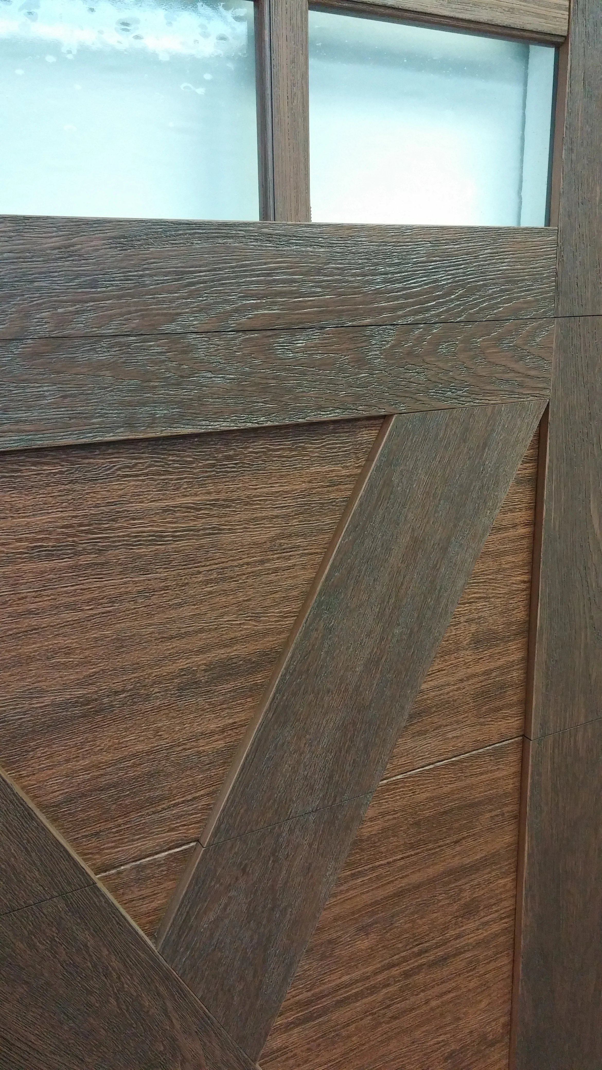 Close-up of wood-grain panel texture and joinery
